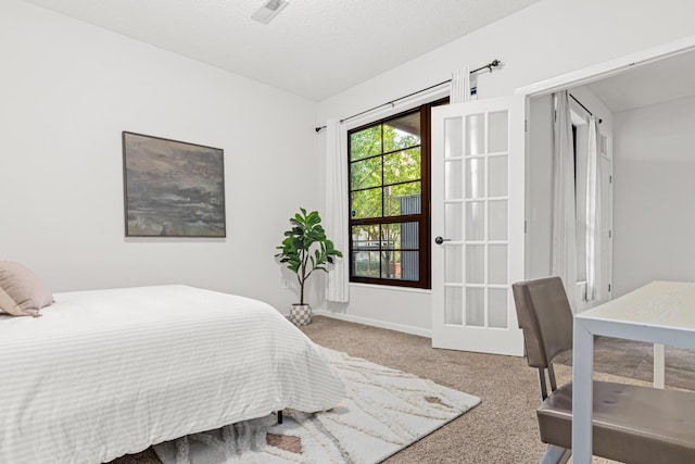 2566 Ellis Ave Unit 103, Saint Paul, MN 55114 - carpeted bedroom with baseboards