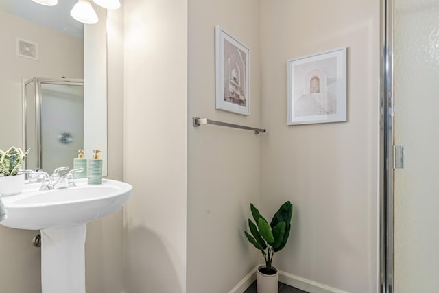 2566 Ellis Ave Unit 103, Saint Paul, MN 55114 - bathroom with an enclosed shower