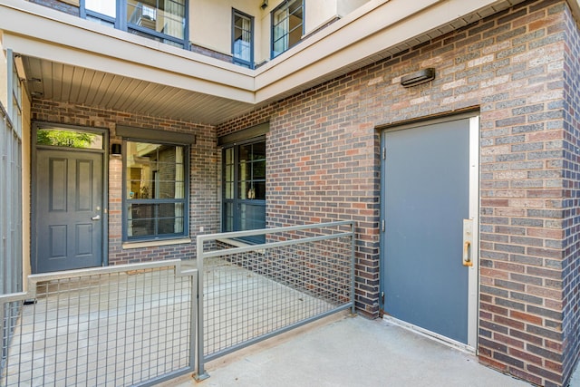 2566 Ellis Ave Unit 103, Saint Paul, MN 55114 - view of exterior entry with brick siding