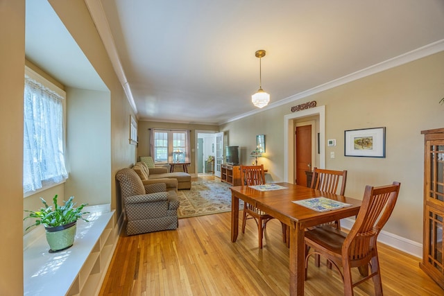 5229 42nd Ave S, Minneapolis, MN 55417 - dining room featuring light wood finished floors and crown molding