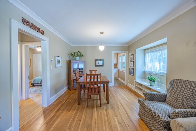 5229 42nd Ave S, Minneapolis, MN 55417 - dining space with light wood-style flooring and crown molding
