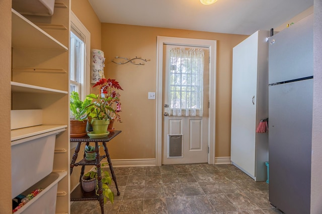 5229 42nd Ave S, Minneapolis, MN 55417 - foyer entrance featuring baseboards and dark stone finish floors