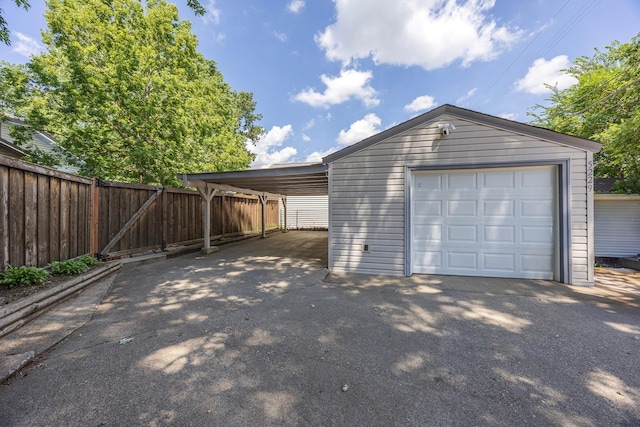 5229 42nd Ave S, Minneapolis, MN 55417 - garage with asphalt driveway and a garage
