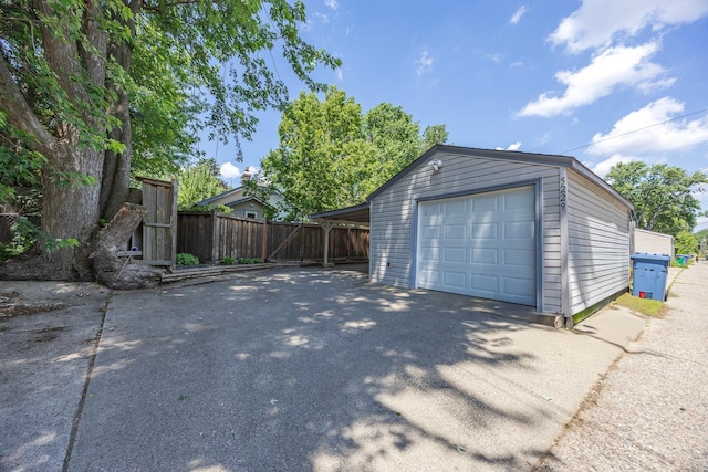 5229 42nd Ave S, Minneapolis, MN 55417 - garage featuring driveway and a detached garage