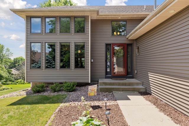 18675 86th Pl N, Maple Grove, MN 55311 - property entrance featuring a lawn and a shingled roof