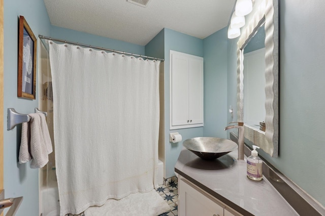 18675 86th Pl N, Maple Grove, MN 55311 - bathroom with vanity, shower / bath combination with curtain, and a textured ceiling