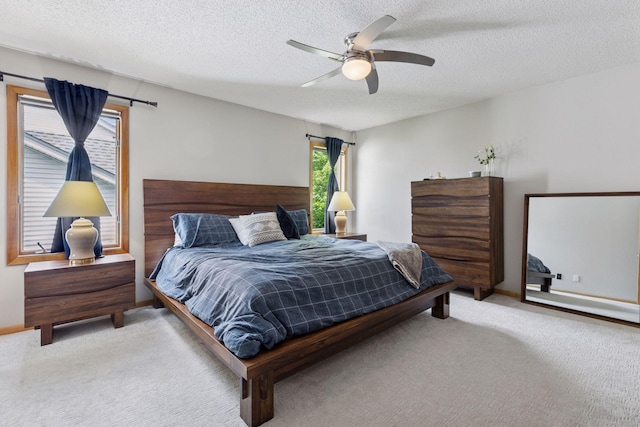 18675 86th Pl N, Maple Grove, MN 55311 - bedroom with carpet flooring, a textured ceiling, and a ceiling fan