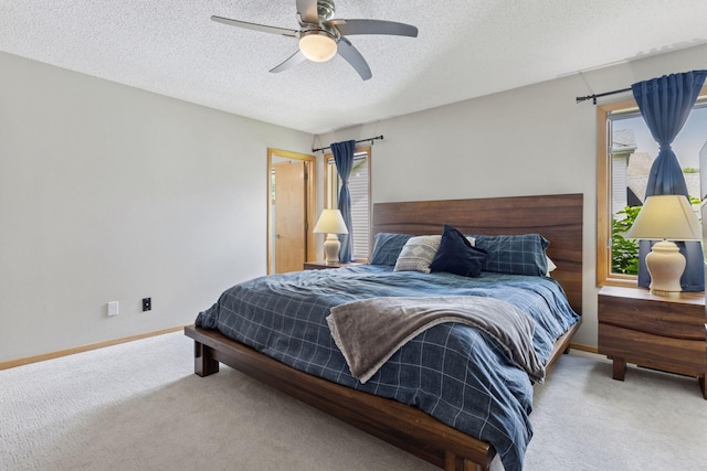 18675 86th Pl N, Maple Grove, MN 55311 - bedroom with carpet flooring, a textured ceiling, and ceiling fan