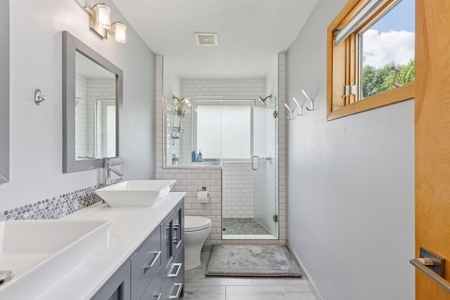 18675 86th Pl N, Maple Grove, MN 55311 - full bath featuring double vanity, a stall shower, and tile patterned floors