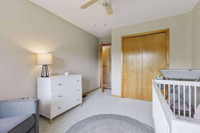 18675 86th Pl N, Maple Grove, MN 55311 - bedroom featuring light colored carpet, a closet, and a ceiling fan