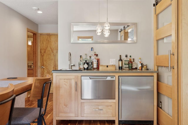 18675 86th Pl N, Maple Grove, MN 55311 - indoor dry bar with stainless steel appliances and dark wood-style floors
