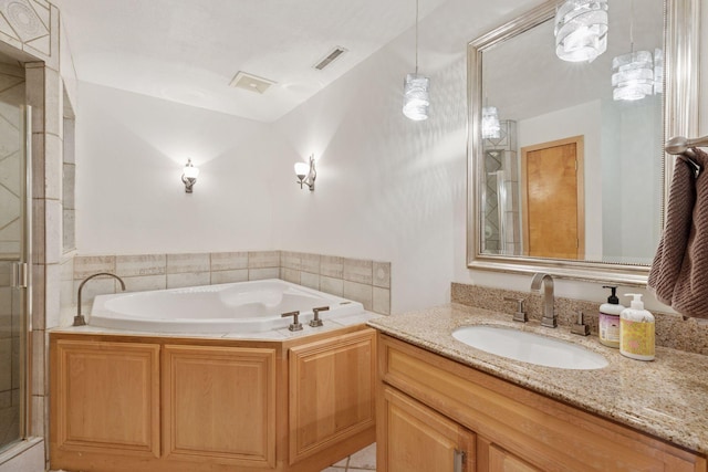 18675 86th Pl N, Maple Grove, MN 55311 - bathroom with vanity, a bath, and a stall shower