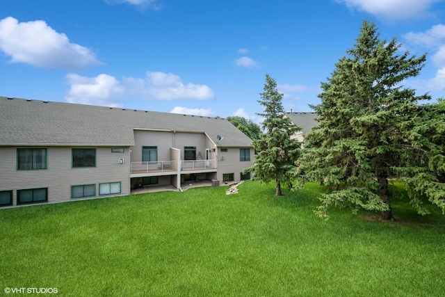 4224 93rd Ave N, Brooklyn Park, MN 55443 - back of property with a lawn and roof with shingles