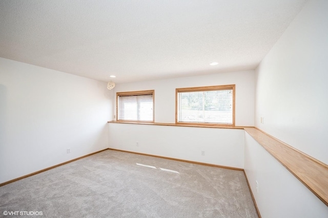 4224 93rd Ave N, Brooklyn Park, MN 55443 - empty room featuring light carpet and recessed lighting