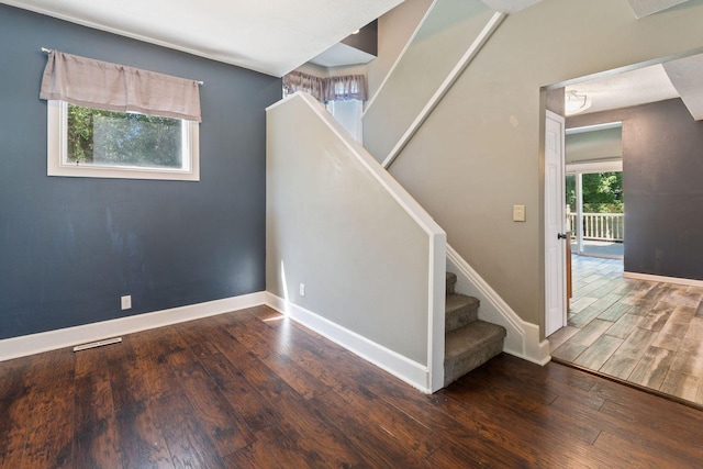 3204 5th Ave S, Minneapolis, MN 55408 - stairway featuring hardwood / wood-style floors and baseboards