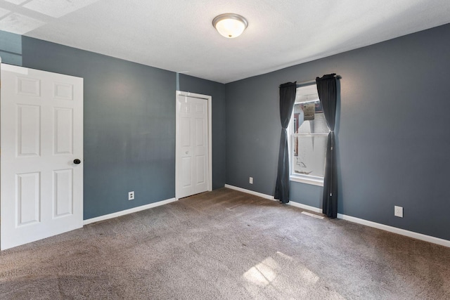 3204 5th Ave S, Minneapolis, MN 55408 - unfurnished bedroom featuring carpet and a closet