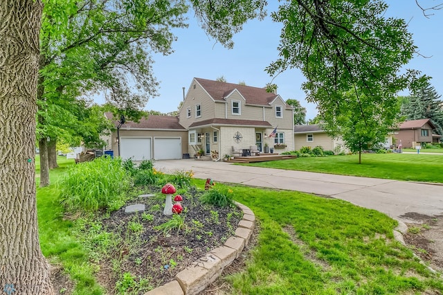 1800 Centre Sq, Moorhead, MN 56560 - traditional-style house with driveway, a garage, and a front yard