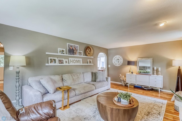 1800 Centre Sq, Moorhead, MN 56560 - living area featuring wood finished floors and arched walkways