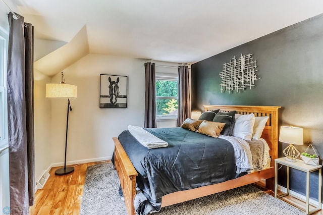 1800 Centre Sq, Moorhead, MN 56560 - bedroom with wood finished floors and baseboards