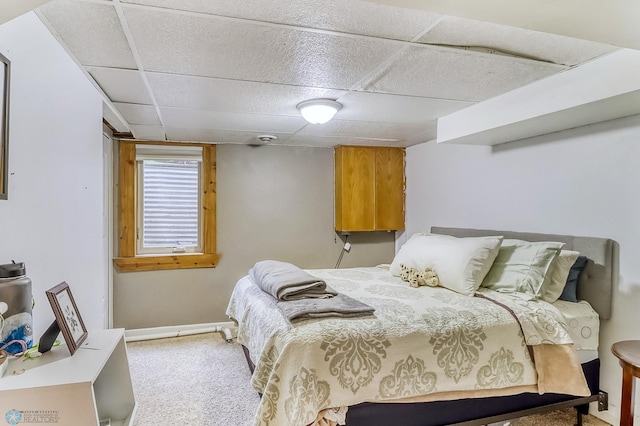 1800 Centre Sq, Moorhead, MN 56560 - bedroom with a paneled ceiling and light carpet