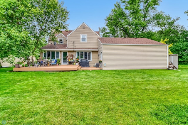 1800 Centre Sq, Moorhead, MN 56560 - rear view of house featuring a deck and a yard