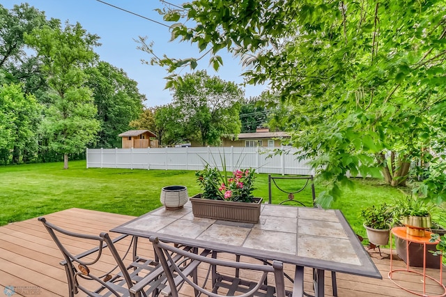 1800 Centre Sq, Moorhead, MN 56560 - wooden deck with outdoor dining area
