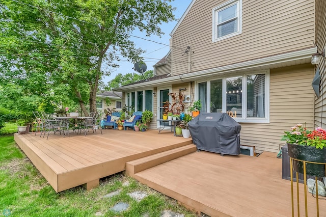 1800 Centre Sq, Moorhead, MN 56560 - wooden deck with a grill and outdoor dining space