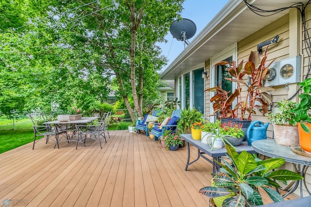 1800 Centre Sq, Moorhead, MN 56560 - wooden deck with outdoor dining space