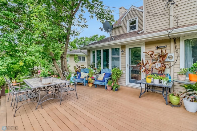 1800 Centre Sq, Moorhead, MN 56560 - wooden deck with outdoor dining area