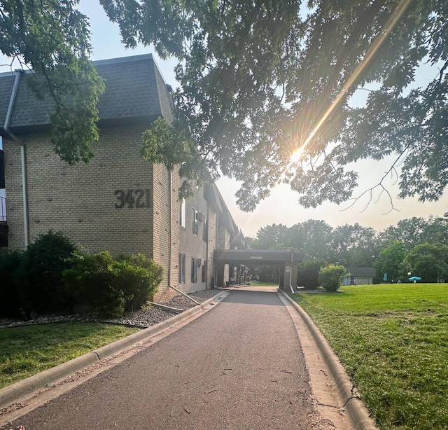 3421 Kent St Unit 607, Shoreview, MN 55126 - view of asphalt road with curbs