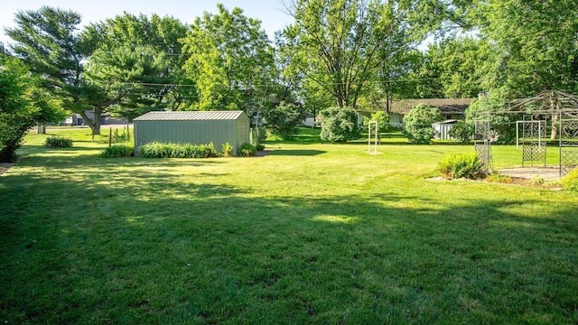 108 Viking Dr, Colfax, WI 54730 - view of green lawn with a storage unit