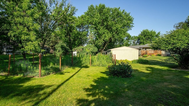 108 Viking Dr, Colfax, WI 54730 - view of green lawn featuring an outdoor structure