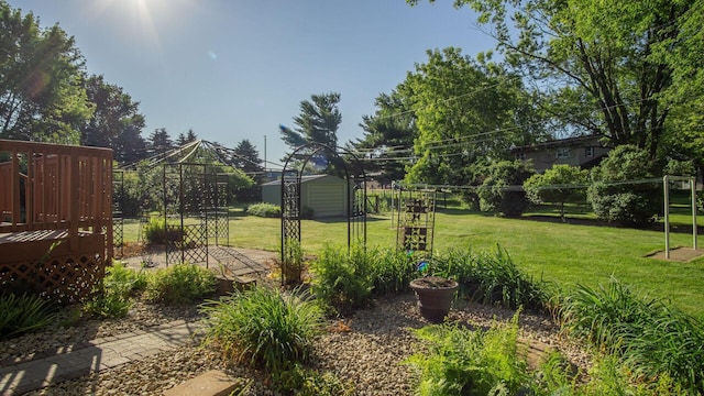 108 Viking Dr, Colfax, WI 54730 - view of yard featuring a deck and an outdoor structure