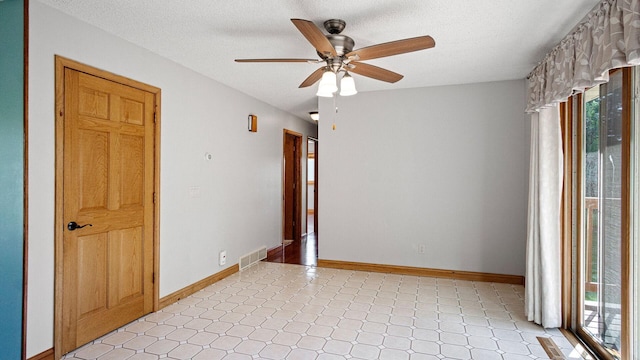 108 Viking Dr, Colfax, WI 54730 - unfurnished room with ceiling fan and a textured ceiling