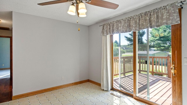 108 Viking Dr, Colfax, WI 54730 - empty room featuring a ceiling fan, a textured ceiling, and light flooring