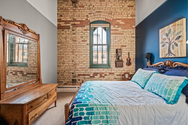 400 1st St Unit 611, Minneapolis, MN 55401 - carpeted bedroom featuring brick wall and a baseboard radiator