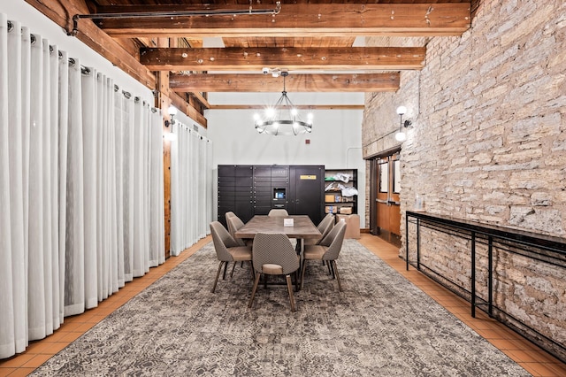 400 1st St Unit 611, Minneapolis, MN 55401 - dining space featuring beam ceiling, light tile patterned flooring, and a chandelier