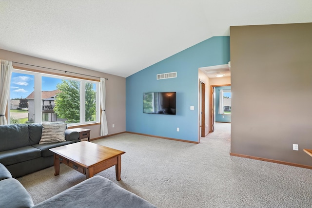 24155 Whispering Cir, East Bethel, MN 55005 - living area with vaulted ceiling and light colored carpet