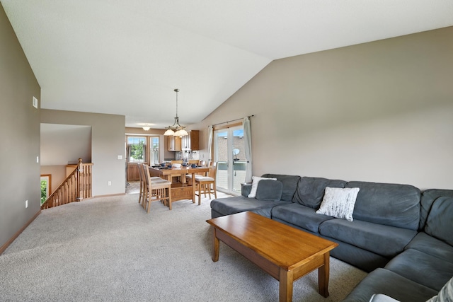 24155 Whispering Cir, East Bethel, MN 55005 - living room featuring lofted ceiling and light colored carpet