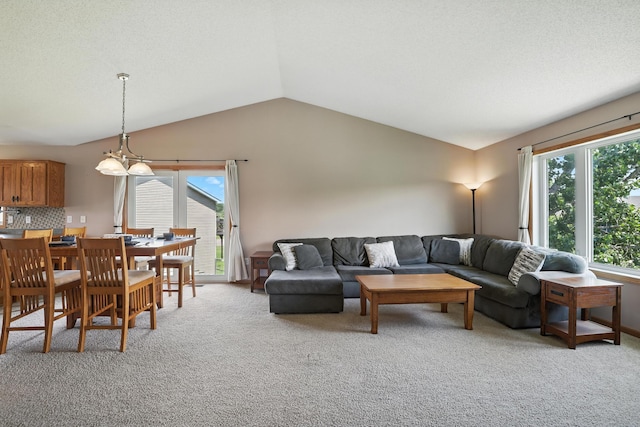 24155 Whispering Cir, East Bethel, MN 55005 - living area featuring light carpet and lofted ceiling
