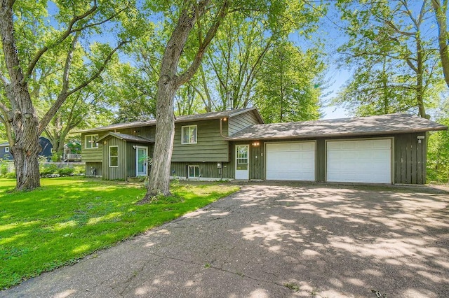 14829 50th St N, Baytown Twp, MN 55082 - view of front of property with driveway, a front yard, and a garage