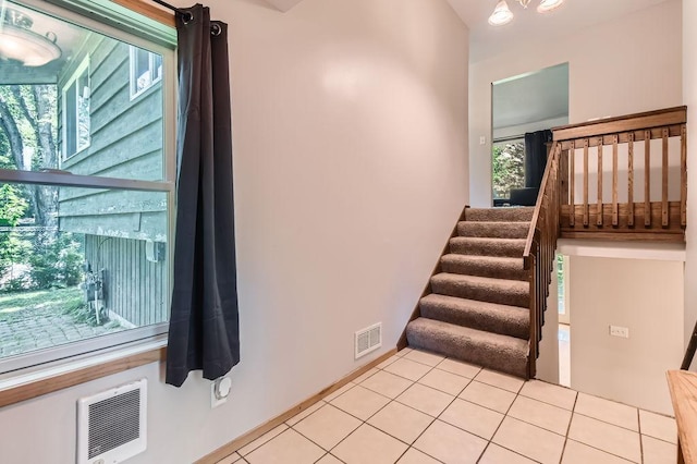 14829 50th St N, Baytown Twp, MN 55082 - stairs featuring tile patterned floors and heating unit