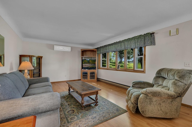 11965 State Highway 15, Kimball, MN 55353 - living area featuring baseboard heating, a wall mounted AC, and wood finished floors