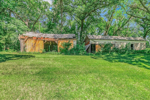 11965 State Highway 15, Kimball, MN 55353 - view of green lawn with an outbuilding