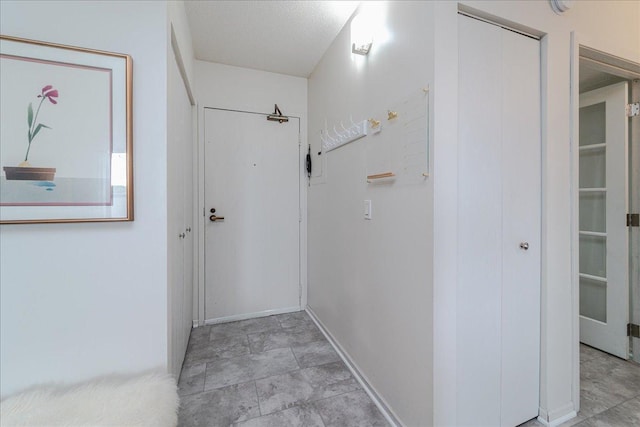 2601 Kenzie Ter Unit 519, Saint Anthony, MN 55418 - hallway featuring baseboards