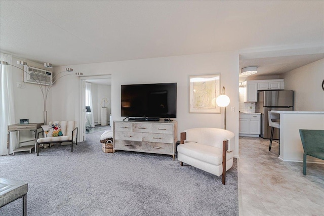 2601 Kenzie Ter Unit 519, Saint Anthony, MN 55418 - living area featuring a wall mounted air conditioner and light colored carpet