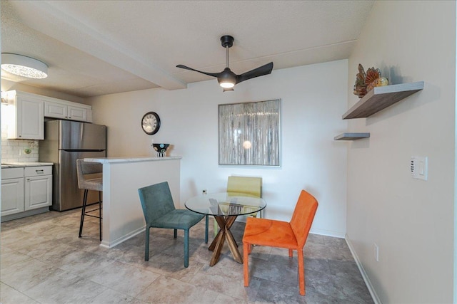 2601 Kenzie Ter Unit 519, Saint Anthony, MN 55418 - dining space with ceiling fan and baseboards