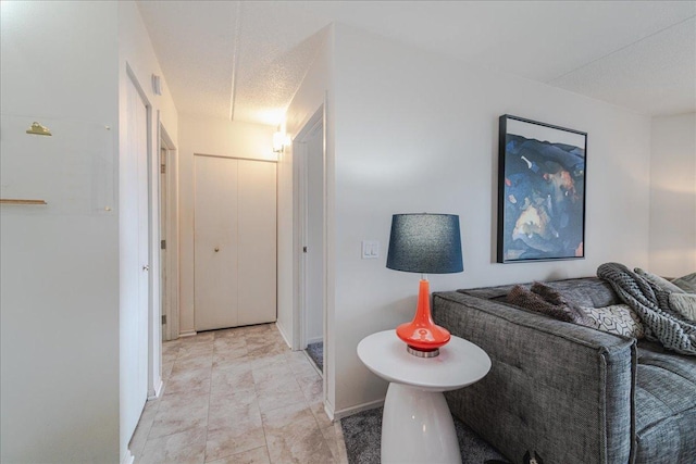 2601 Kenzie Ter Unit 519, Saint Anthony, MN 55418 - hallway featuring baseboards