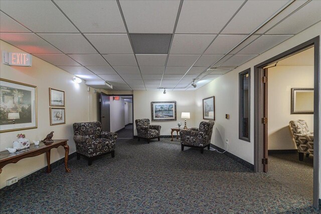 2601 Kenzie Ter Unit 519, Saint Anthony, MN 55418 - sitting room featuring carpet and a paneled ceiling