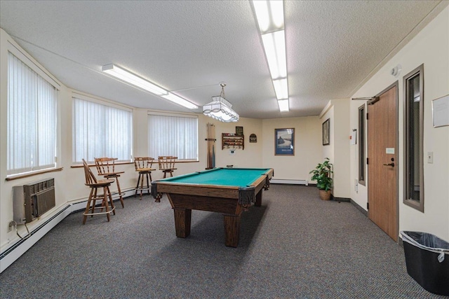 2601 Kenzie Ter Unit 519, Saint Anthony, MN 55418 - recreation room with carpet flooring, a textured ceiling, billiards, a wall unit AC, and a baseboard radiator